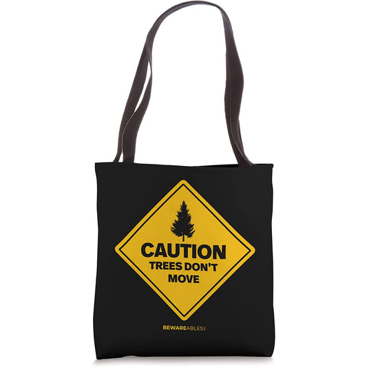 Caution. Trees don't move ski and snowboard funny Tote Bag